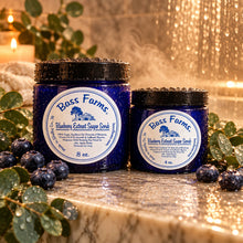 Load image into Gallery viewer, Two jars of Bass Farms Blueberry Extract Sugar Scrub, one larger and one smaller, with blue labels on top.
