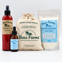 Load image into Gallery viewer, Bass Farms laundry products including a bottle, bag, and soap on a white background.