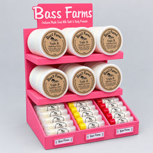 Load image into Gallery viewer, Bass Farms product display with various items on a blue background