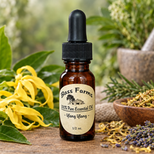 Load image into Gallery viewer, A small amber glass bottle with a black dropper containing essential oil, labeled with the brand Bass Farms.