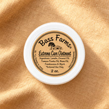 Load image into Gallery viewer, A close-up shot of a white plastic jar of Bass Farms Extreme Care Ointment. the ingredients listed include lanolin, coconut oil, and neem oil